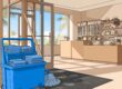 A blue cleaning caddy stands beside a sandy entry mat in a bright shop.